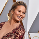 Illustration for article titled Chrissy Teigen Receives Kinda Creepy Kinda Nice Paparazzi em/emShots Of Herself